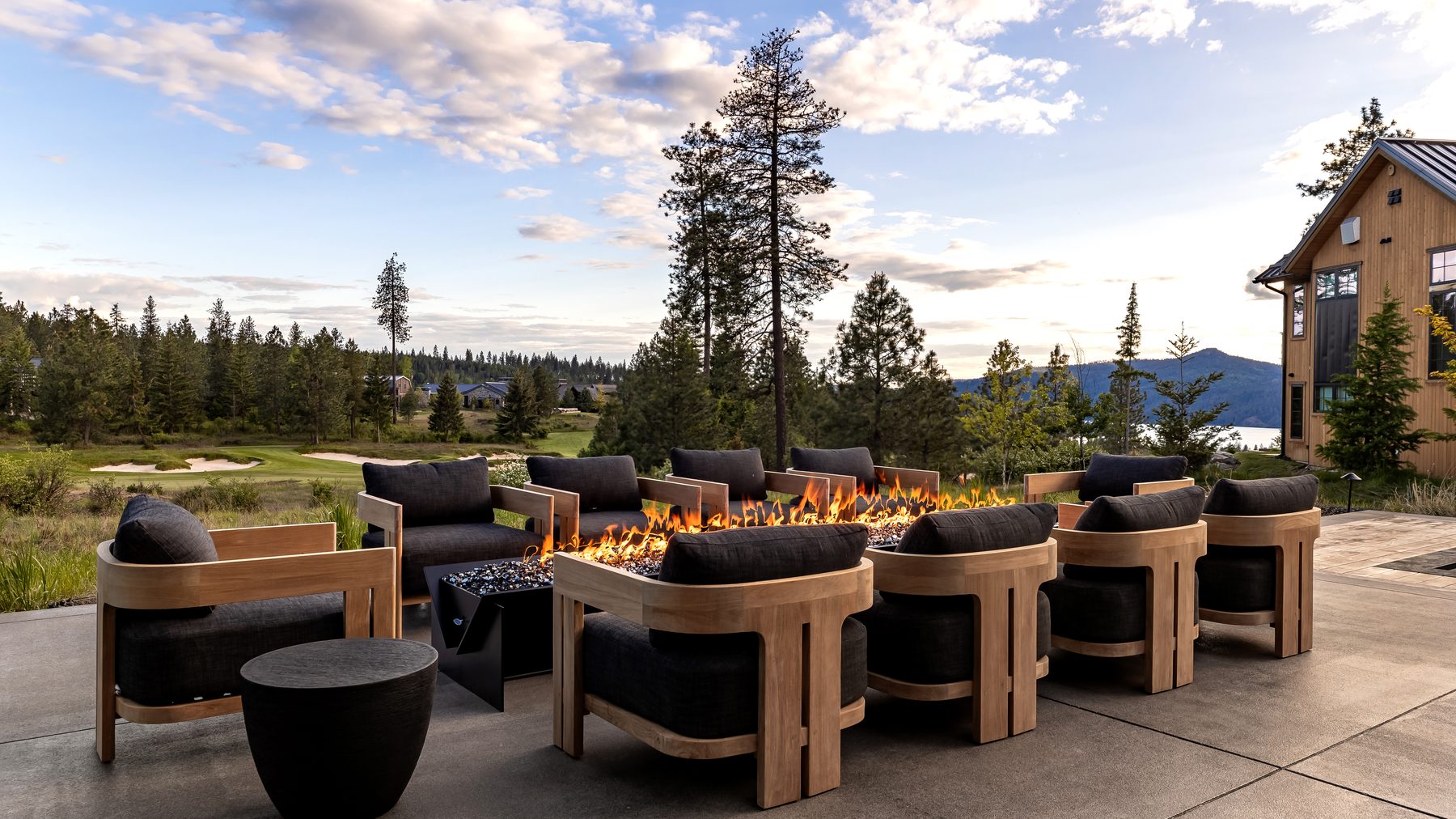 Gozzer Ranch fire-pit terrace at sunset above Lake Coeur d'Alene