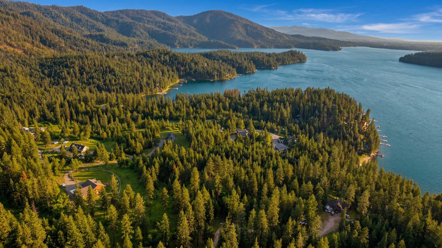 Forested shoreline and homes on Hayden Lake, North Idaho