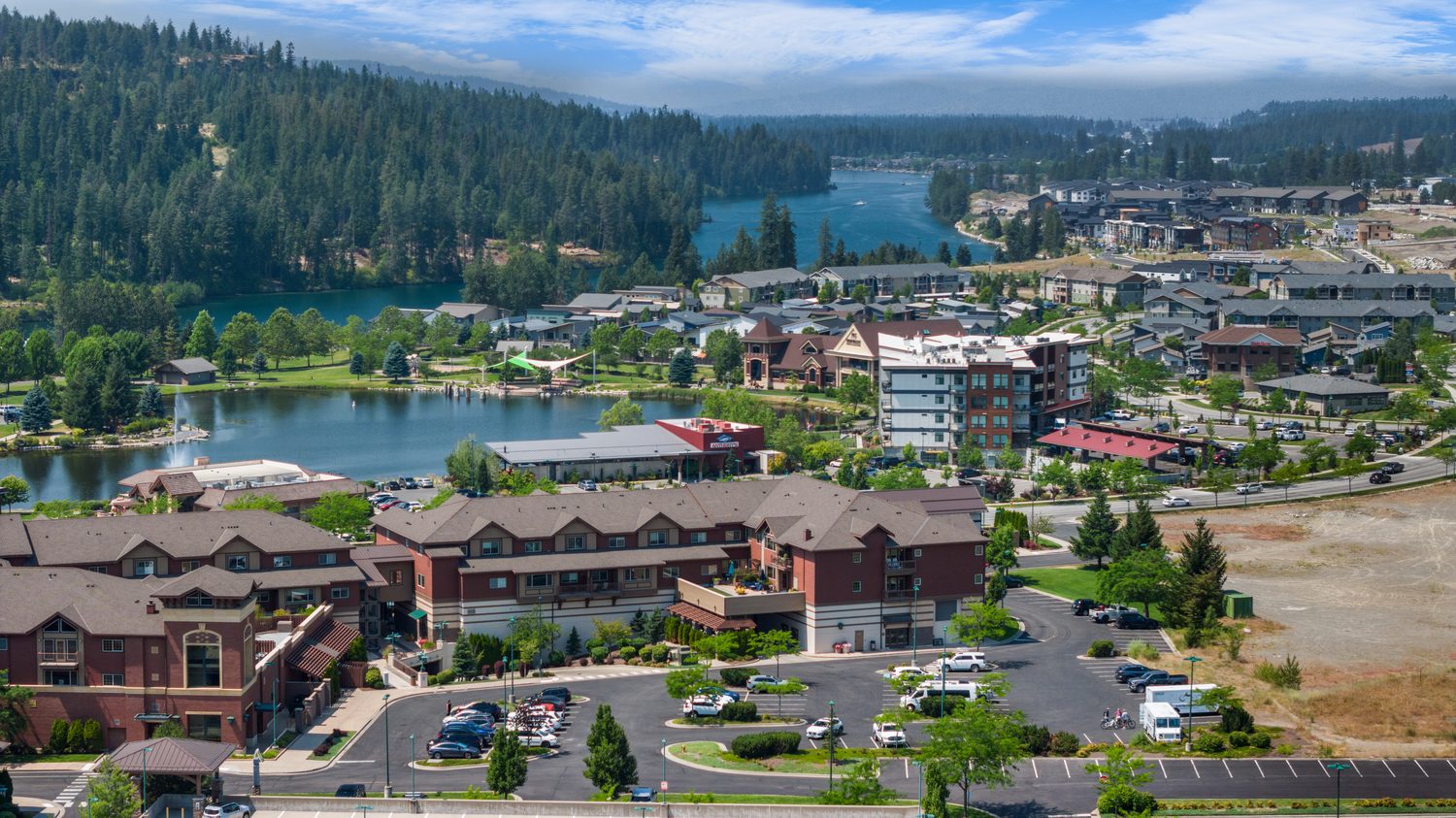 Aerial of the Village at Riverstone with its pond and residences, Coeur d'Alene